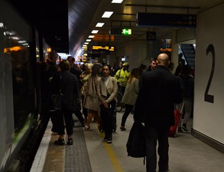 Passengers at rail station