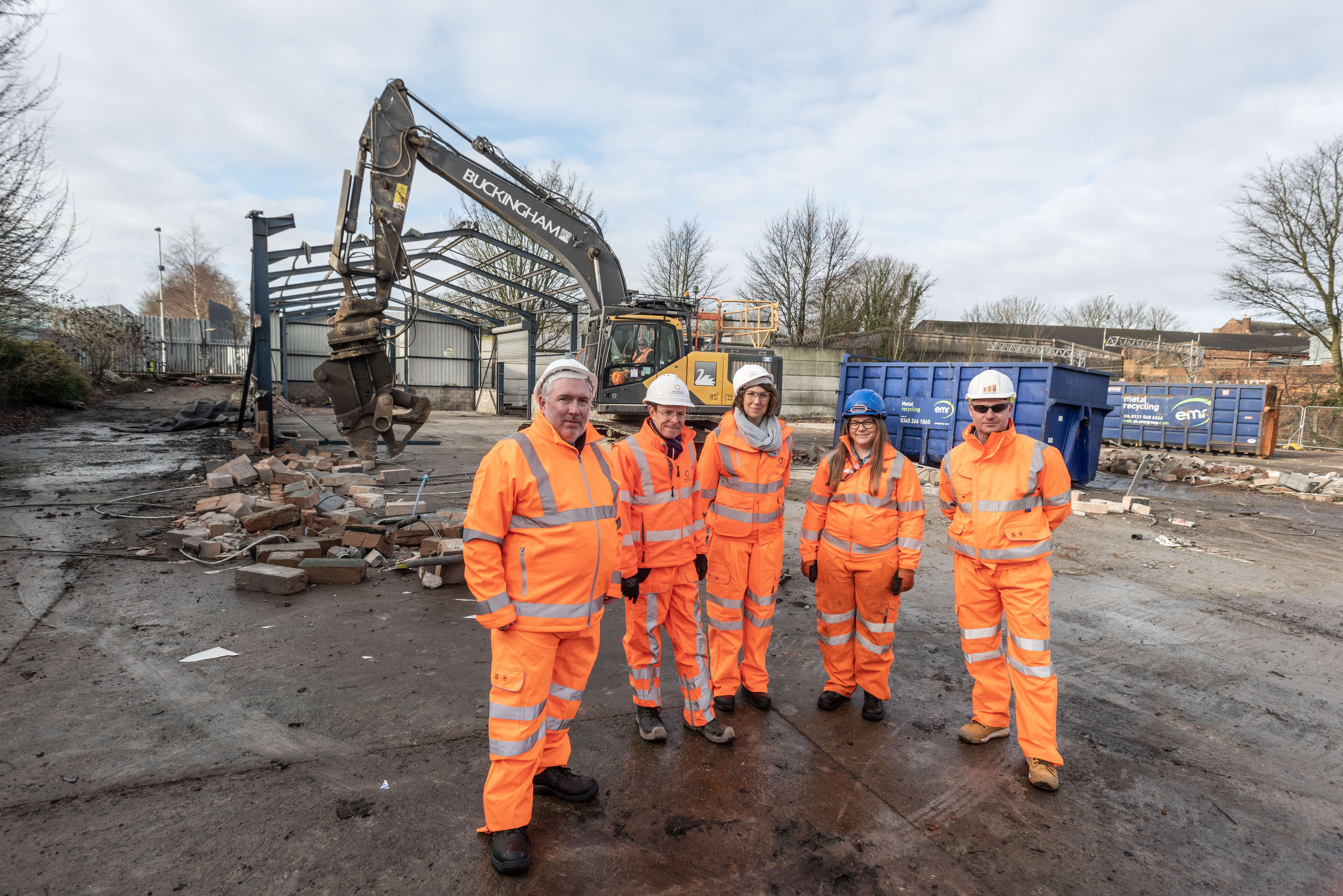 Representatives from project partners at the demolition site